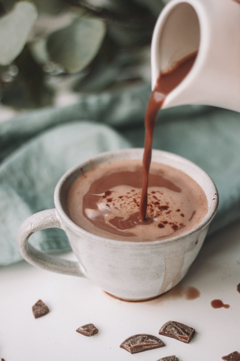 Pouring a cup of cocoa