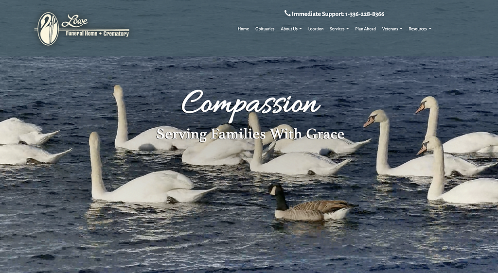 Funeral homepage screenshot with swans swimming in a lake and the word Compassion written across the image