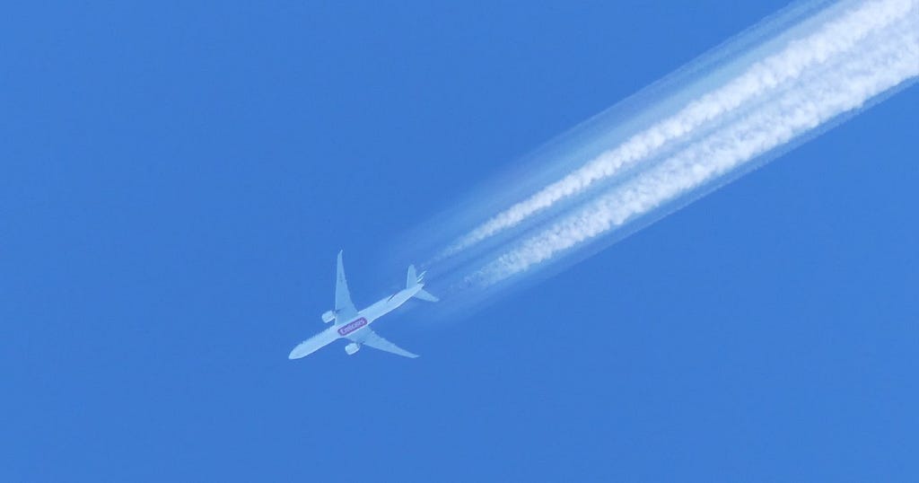 A plane is releasing “Chemtrails”