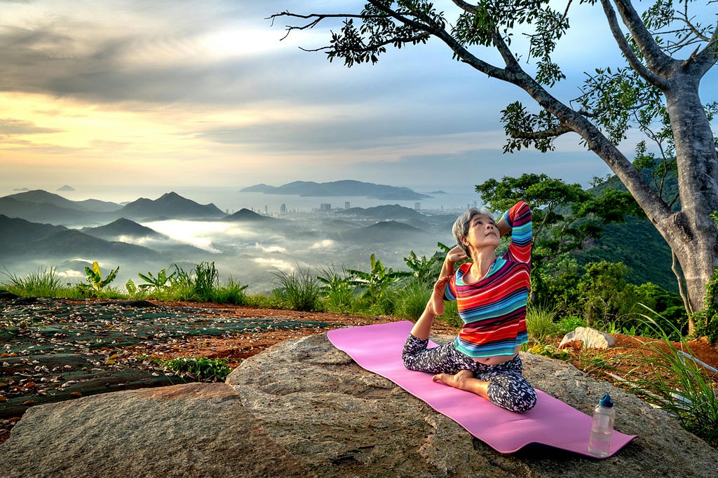 senior travel woman exercise yoga physical benefits