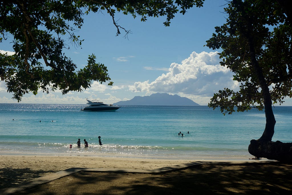 Beau Vallon beach on Mahé in the Seychelles. © April Orcutt