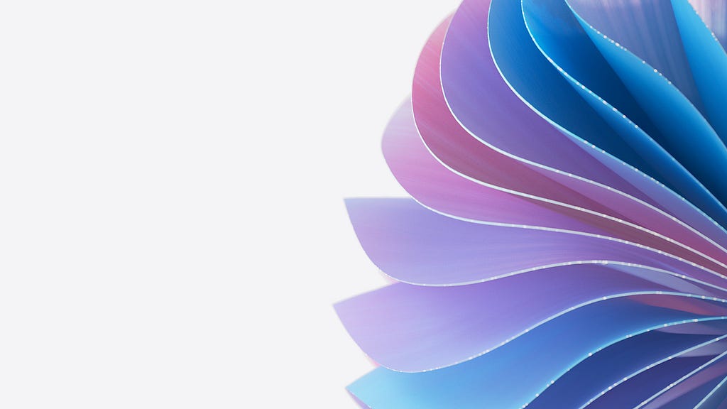 A close up of the digital ribbon concept shows blue and purple hued petals unfolding, representing the complexity and flexibility that is the power of the cloud.