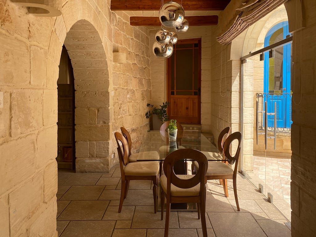 Dining room of a modern/traditional house of character in Zejtun, Malta.