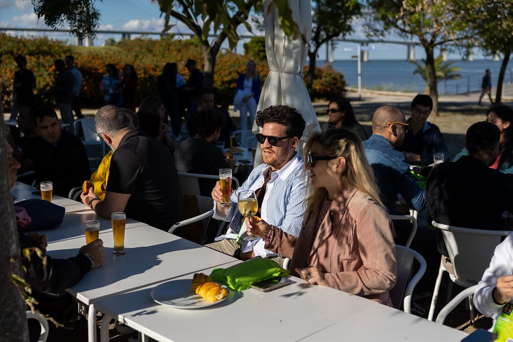 Attendees having some drinks during the Welcome Party.