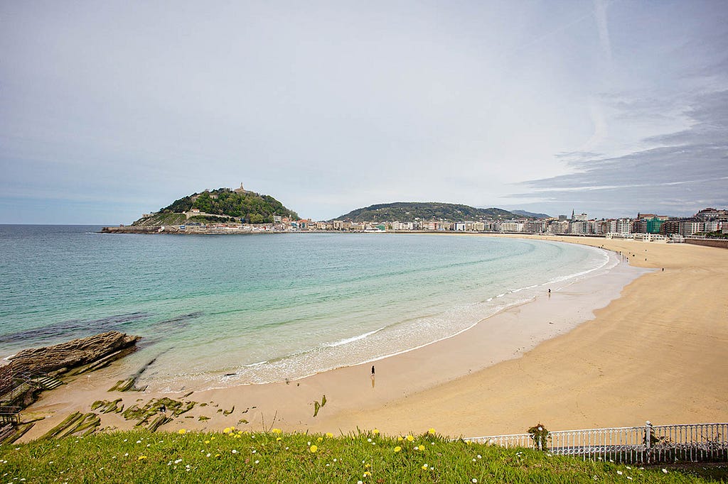 a long broad beach stretching out into the distance