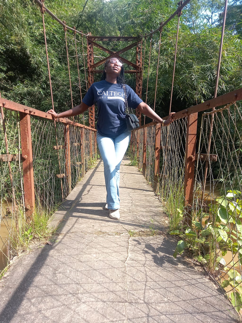 Ibukunoluwa at an old suspended bridge