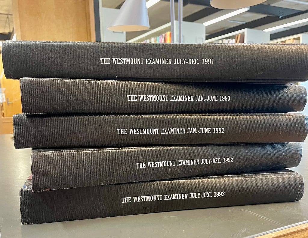 stack of archived Westmount Examiner newspapers from 1991–1993
