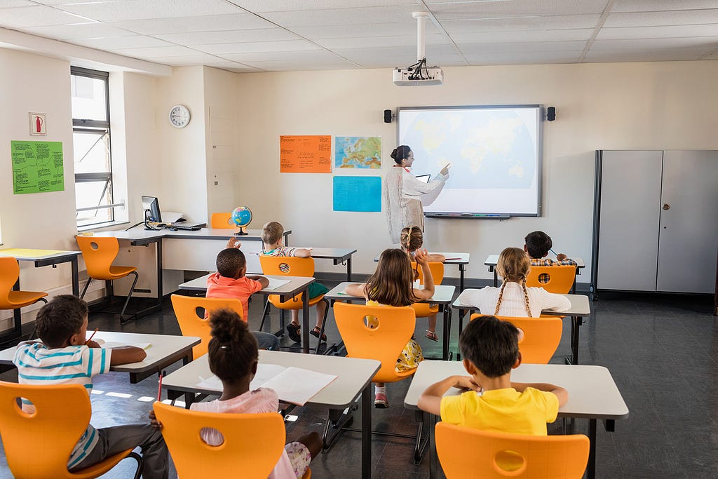 Young children in classroom.