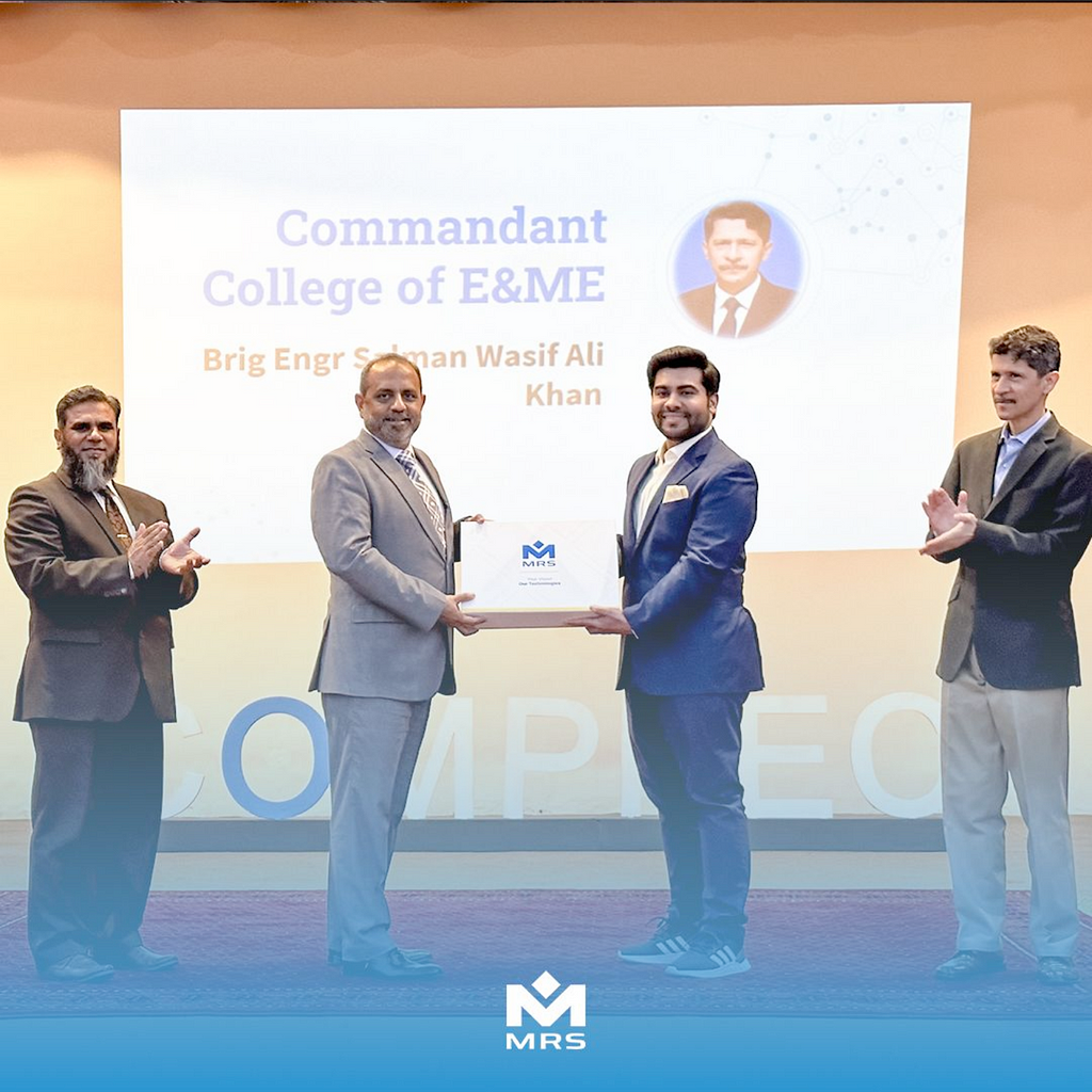 Umer Farooq, CTO of MRS Technologies presenting a goodie bag to Professor Dr Shoab Ahmed Khan, who was the chief guest at COMPPEC’23. MRS Technologies sponsored the all Pakistan project exhibition| Blog written by Umer Farooq