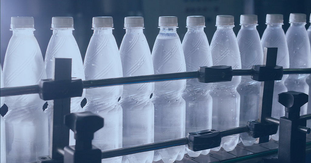 picture shows bottled water on a production line in a factory