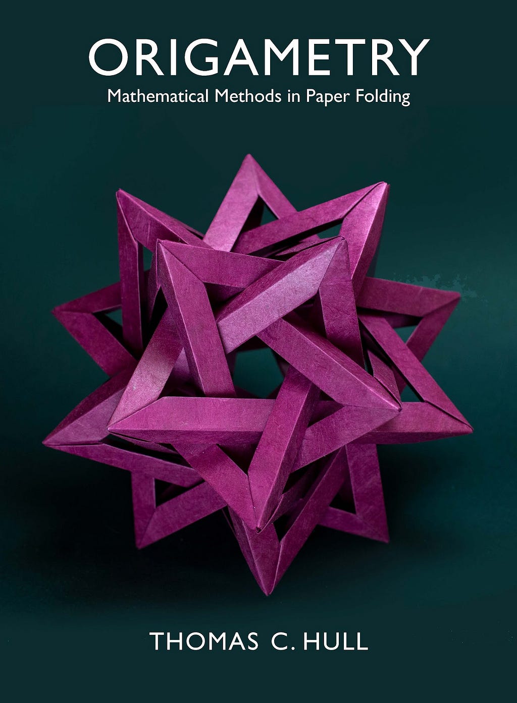 The cover of Thomas Hull’s Origametry, featuring his Five Intersecting Tetrahedra model.