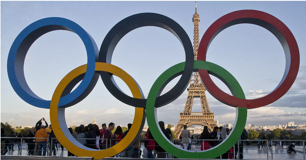 The Olympic rings are set up at Trocadero plaza that overlooks the Eiffel Tower in Paris on Sept. 14, 2017