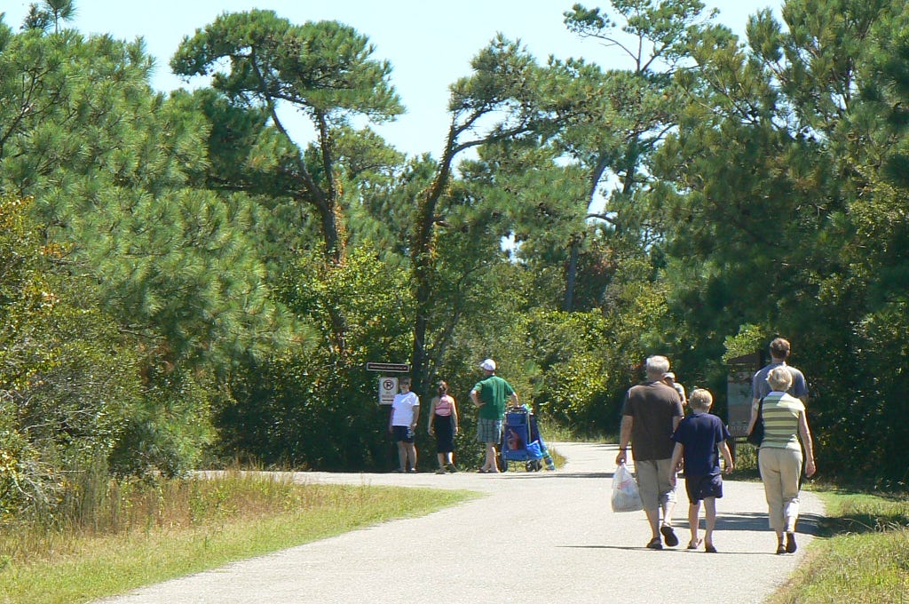 Visitors walk along the paved trails at Chincoteague National Wildlife Refuge. Michael Dixon/USFWS