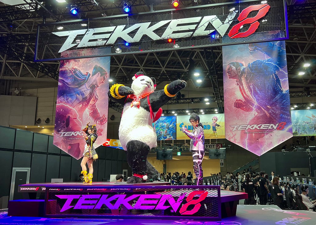 panda costume player on the stage for Tekken8 in Tokyo Game Show