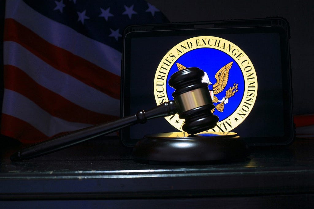 Gavel with Securities Exchange Commission logo