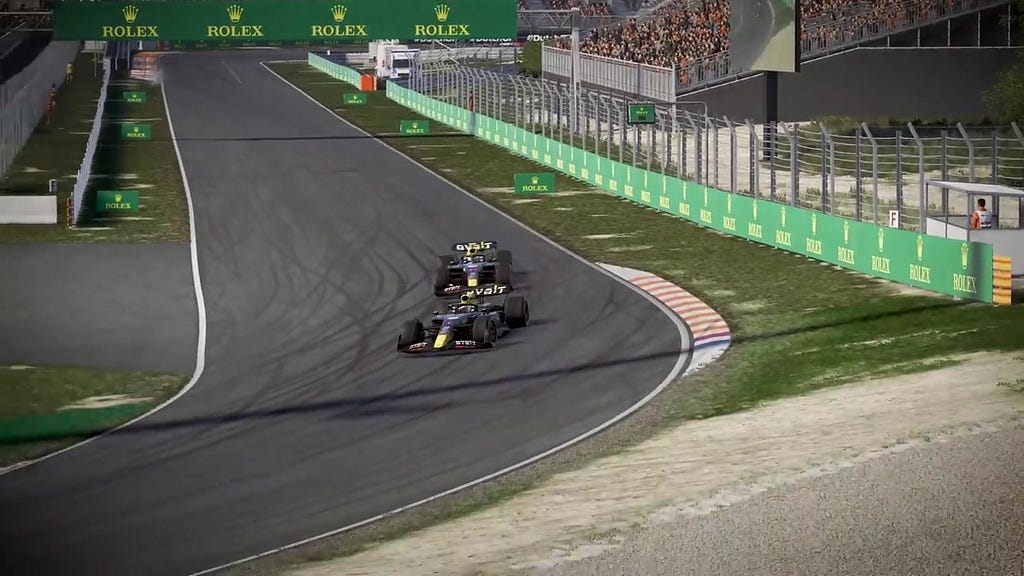 Cars speeding down the track during a race in F1 24.