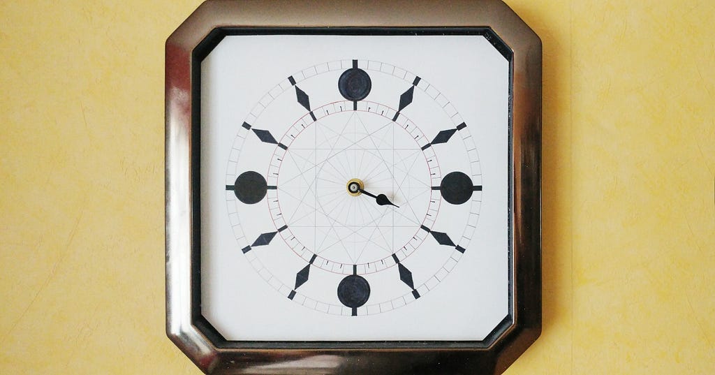 A photo of my wallclock with one hand indicating the hour
