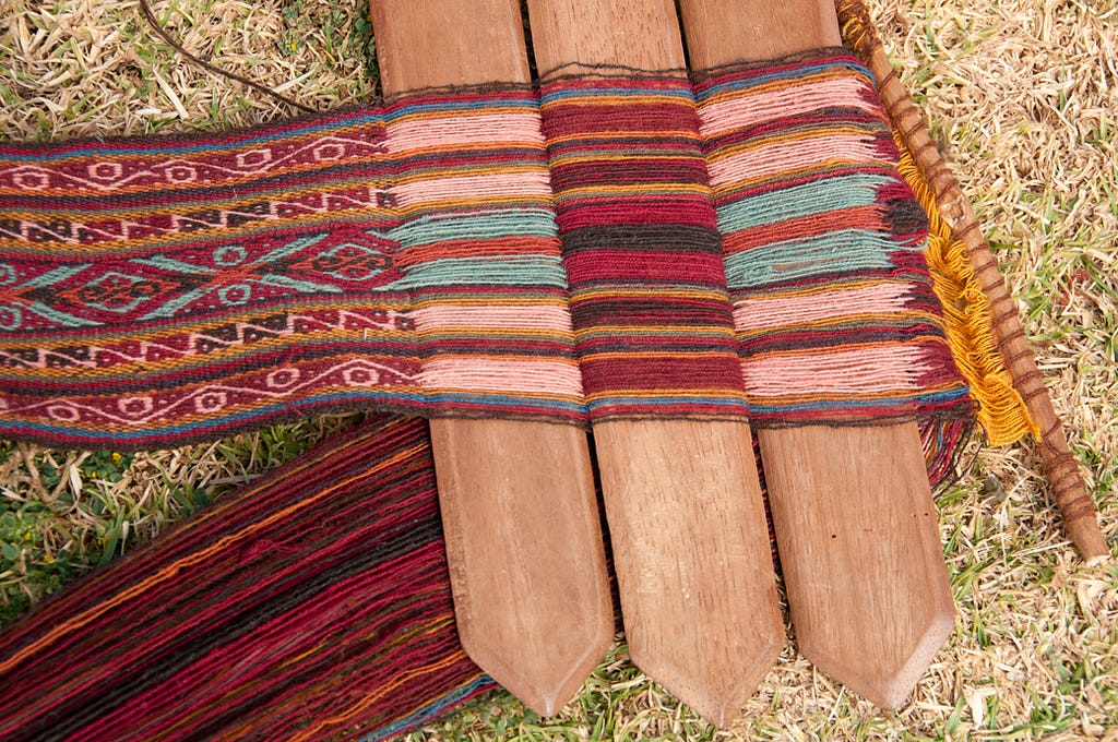 Intricate Quechuan weaving patterns are displayed on this backstrap loom in Chinchero, Peru. (© April Orcutt. All Rights Reserved)