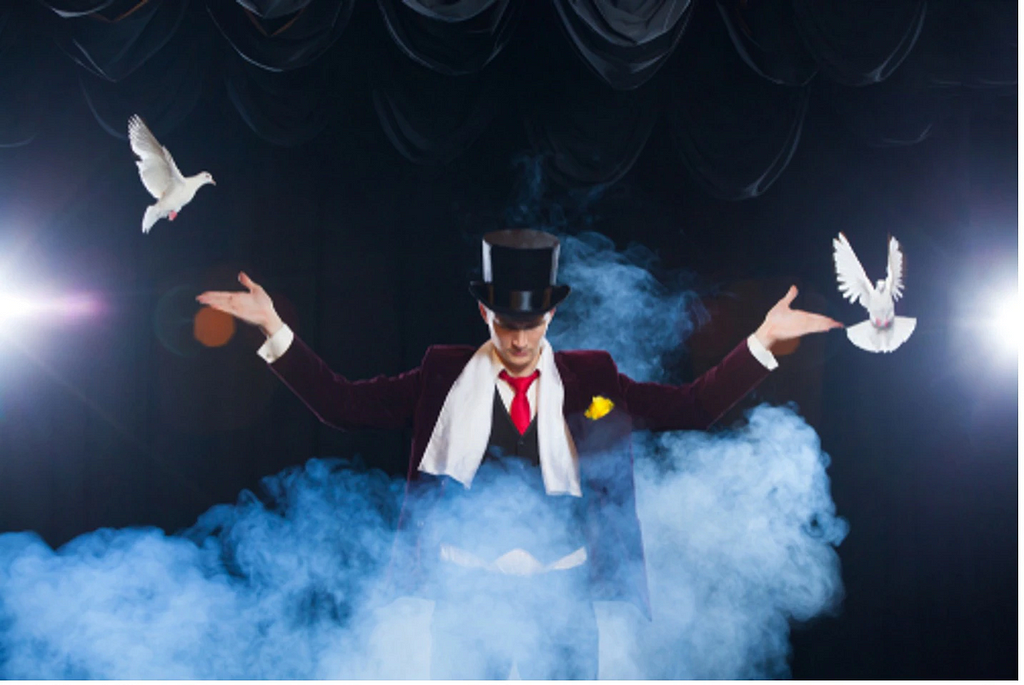 white doves flying around a magician with cloud of smoke in front of him