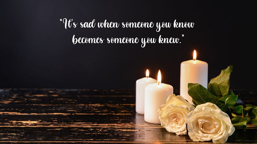 Burning candles with white roses in a dark background along with a sad quote about life
