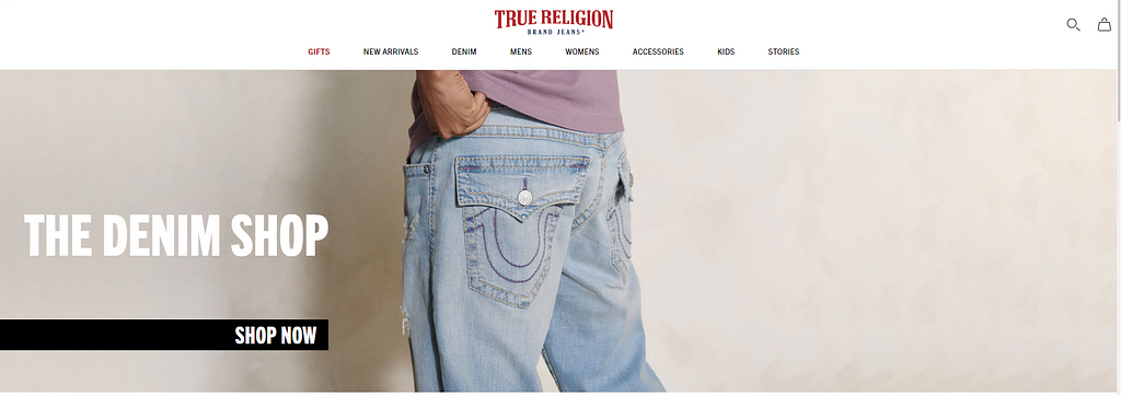 True Religion Home Page blue jeans purple t-shirt