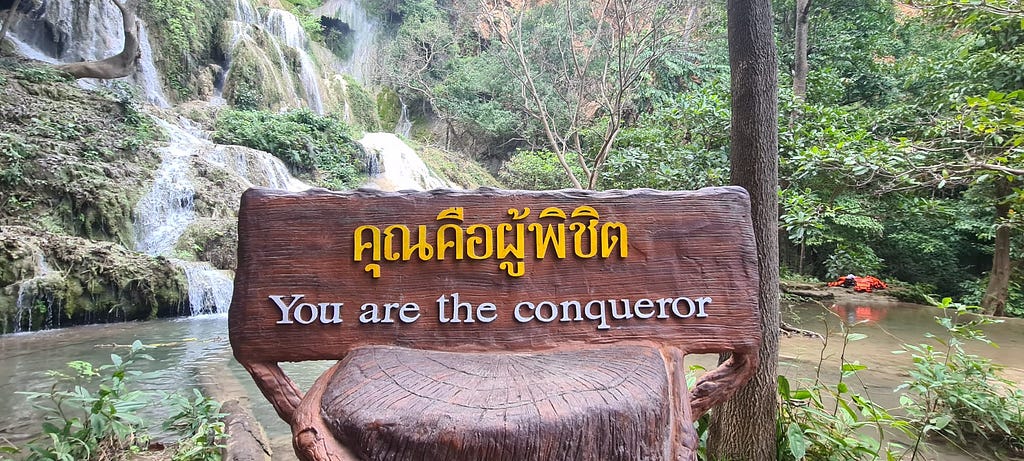 Summit sign that says ‘You are the conqueror’