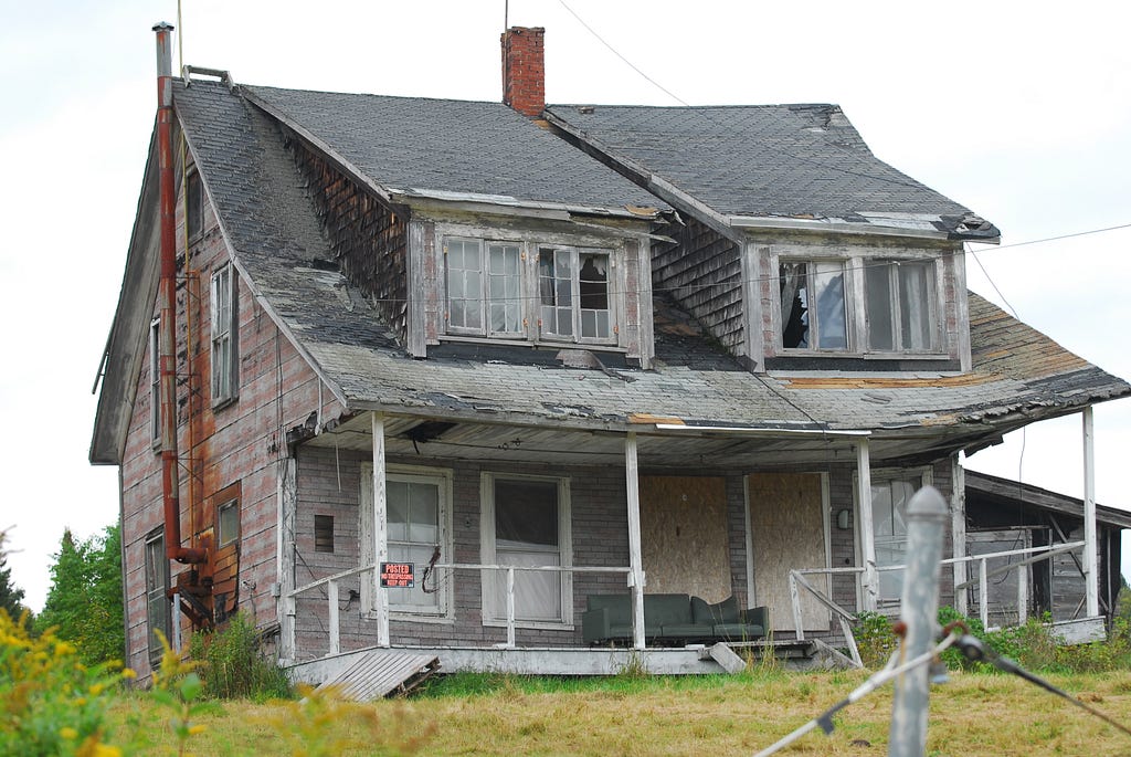 abandoned, decrepit house