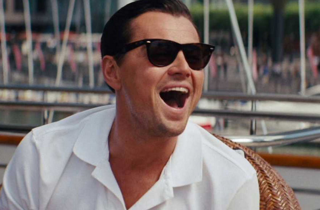 Leonardo DiCaprio laughing in the Wolf of Wall Street