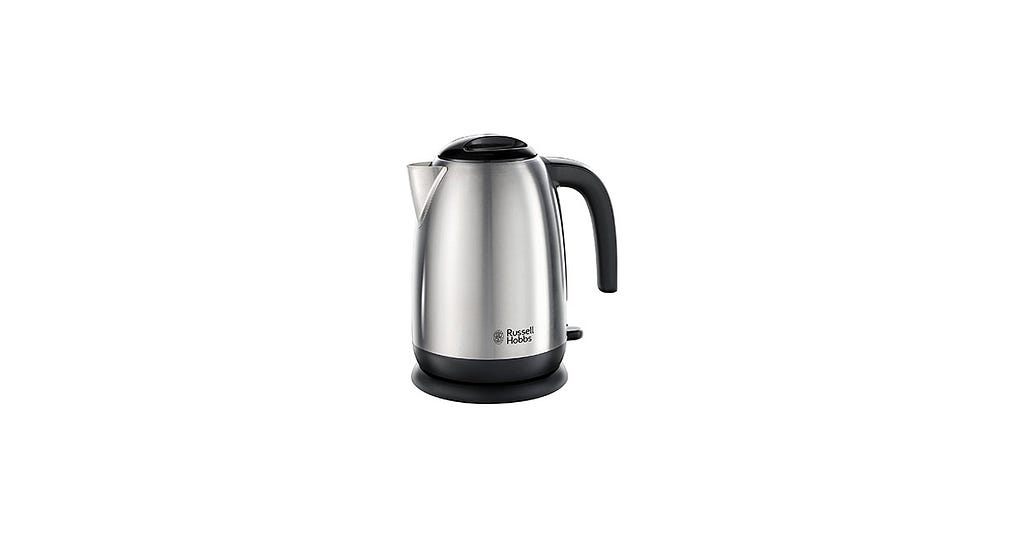 A silver kettle with a black base, sits in front of white background.