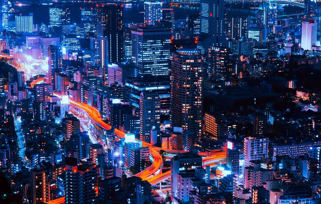 a photo of a cityscape at night time