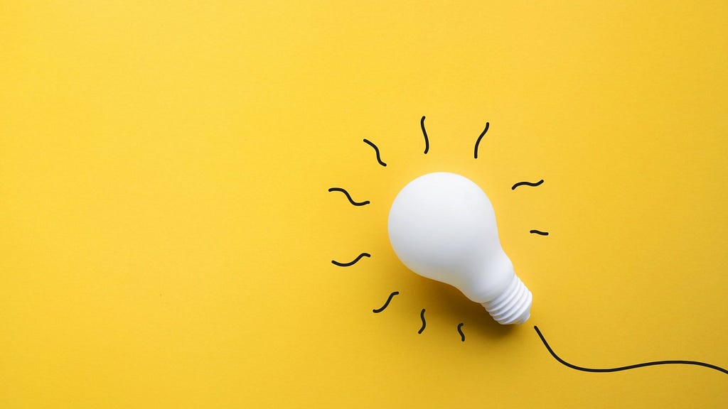 A light bulb that indicates the Aha moment when thinking about ideas