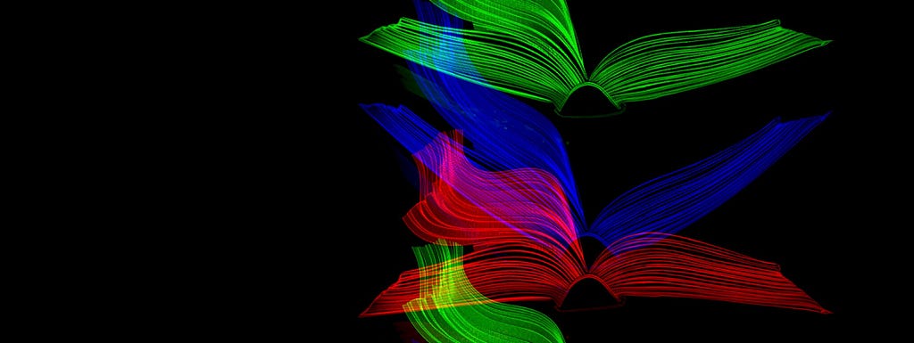 Illustration of open books in green, blue, and pink on a black background