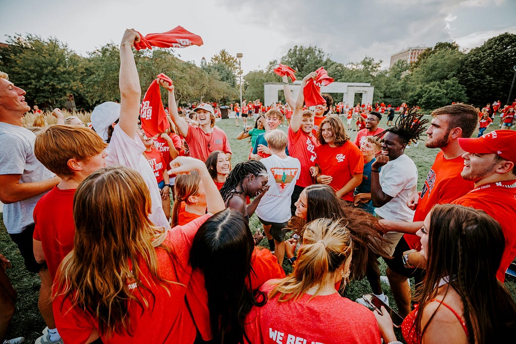 A group of students dance at the Chancellor’s BBQ to welcome the class of 2026 in the greenspace by the Nebraska Union