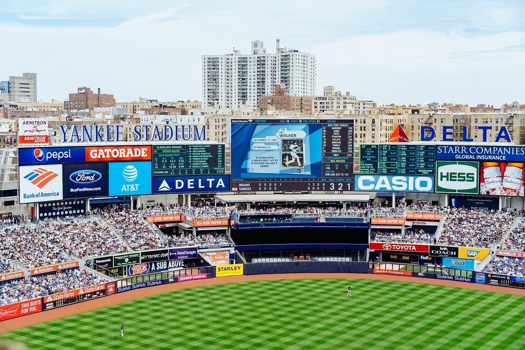 Billboards at Yankee Stadium showing different logos