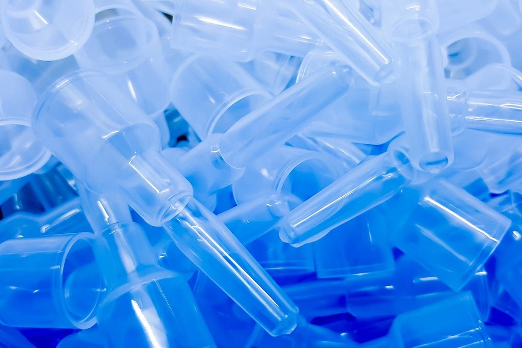 thousands of the same medical component are made of clear injection-molded plastic, to ensure strict standards and safety
