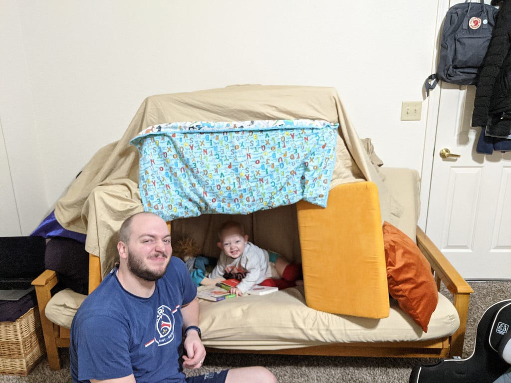 Clark and I proudly posing in front of the fort we built.