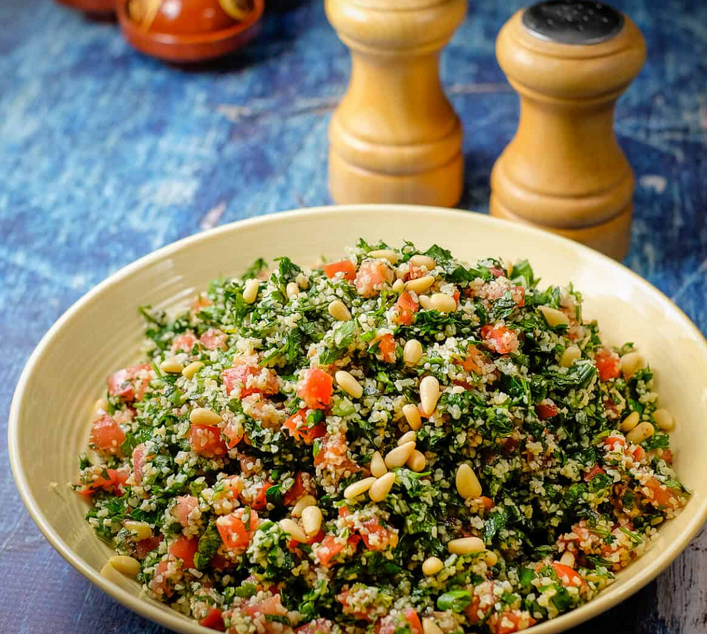 Tabbouleh Salad sprinkled with Pine Nuts