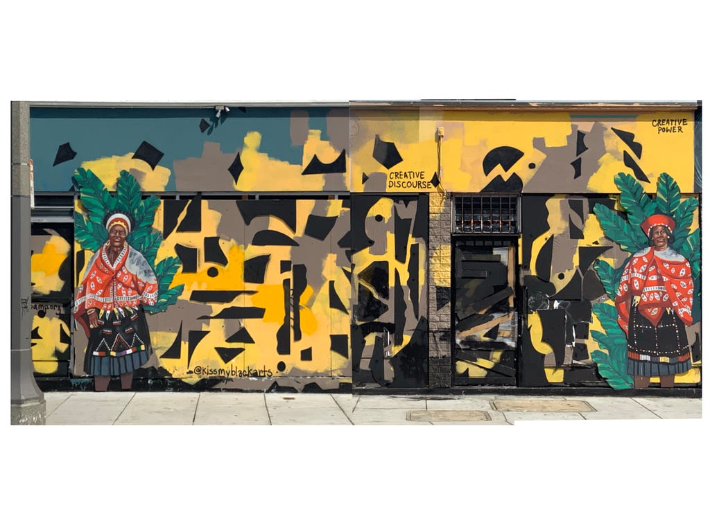 A Black woman, reminiscent of the leader of the Maroons, stands before a yellow, black, and green background. “Untitled (SF Mural)” 10x30 ft Latex paint and Recycled wood.