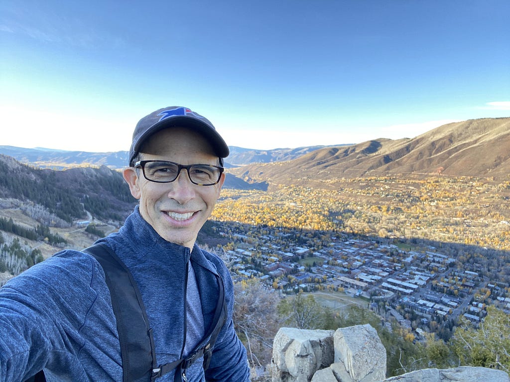 Michael Hoffman on top of Ute Rock in Aspen
