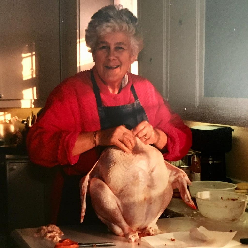 Granny stuffing a turkey