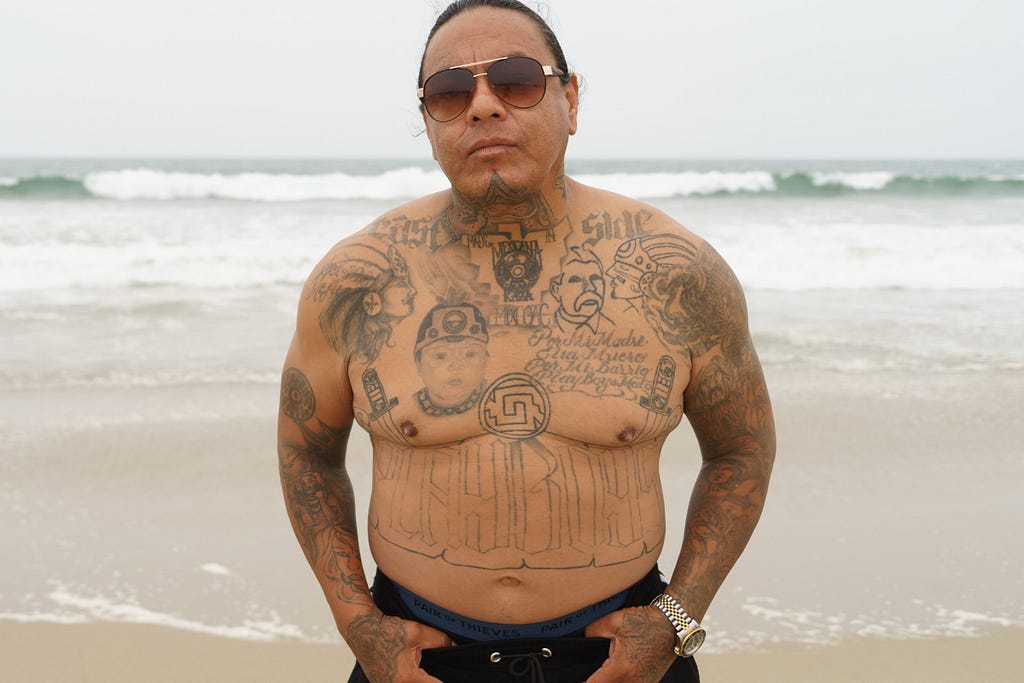 Remigio “Mike” Chavez aka Duke Loco, is photographed on Santa Monica Beach in 2022 by David William Reeve.