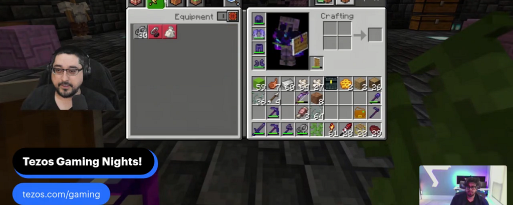 A livestream screenshot showing Minecraft gameplay with inventory open, flanked by video feeds of two streamers, AJ and Blangs, during Tezos Gaming Night.