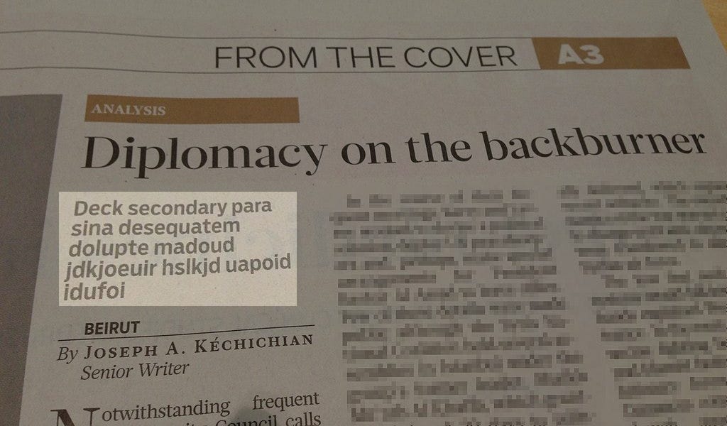 Lorem ipsum-like text in a newspaper sub-title