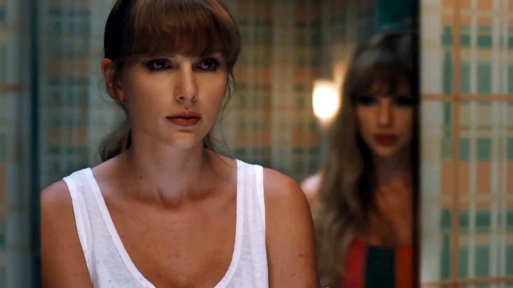 Taylor Swift looking at her alter ego in the mirror.
