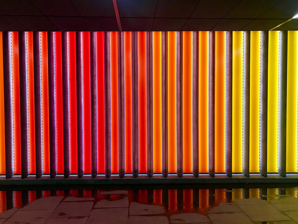 An arrangement of colored lights denoting a spectrum