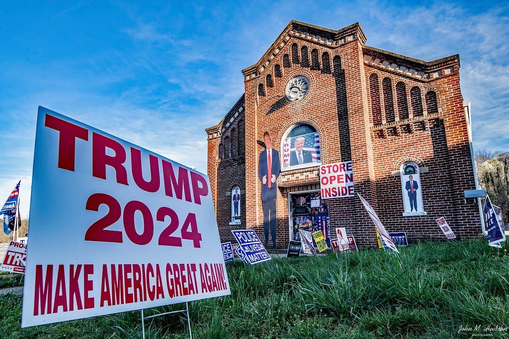 Photo of the church displayign multiple Trump for President signs, where Alito worships.