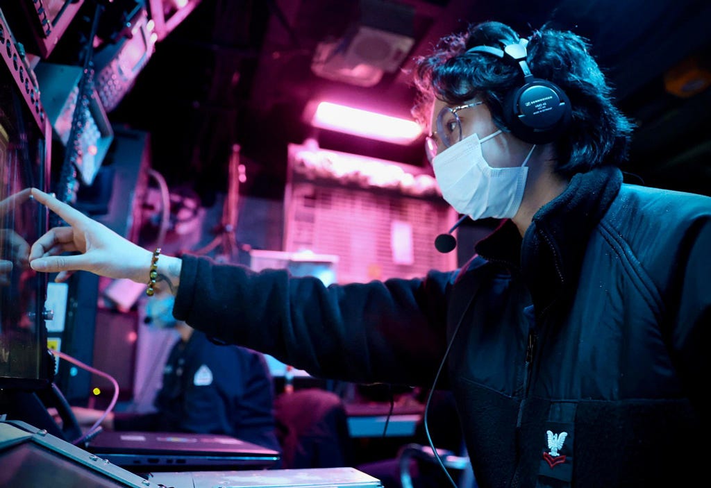 A cryptologic technician identifies radar contacts in the combat information center aboard the USS Barry during the bilateral exercise Resilient Shield 2022. Photo by Ensign Emilio Mackie/U.S. Navy