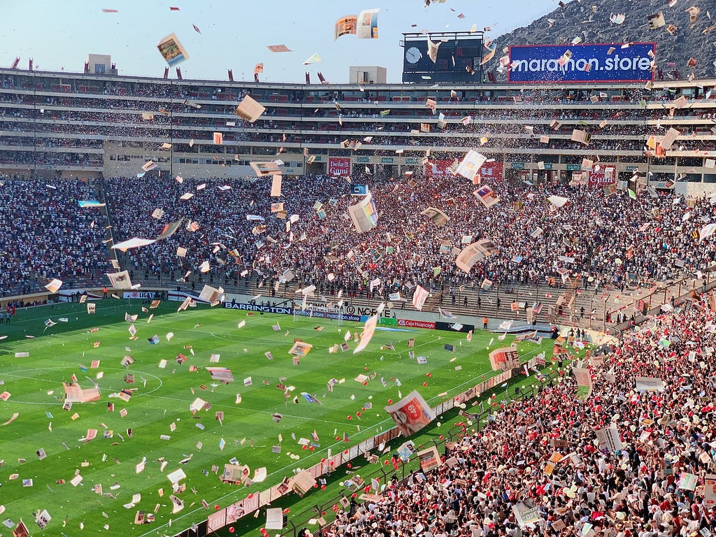 Photo of fans at a football stadium