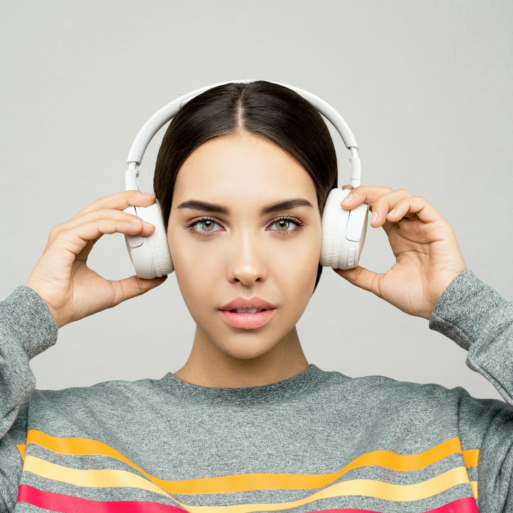 woman with over the ear headphones