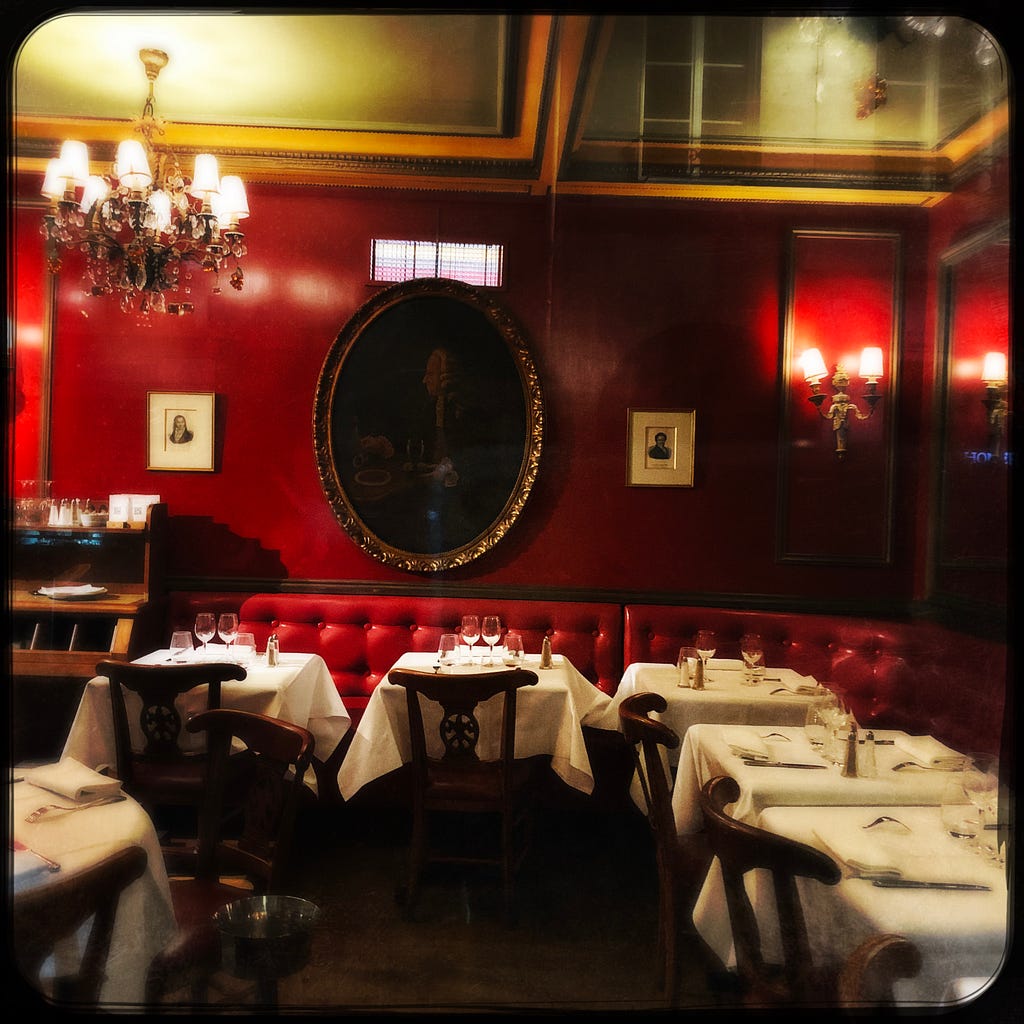 A view into the one of the red-walled dining rooms in Le Procope, arguably Paris’s oldest restaurant, and a haunt of many writers since the eighteenth century, including the philosopher Denis Diderot and the poet Paul Verlaine.